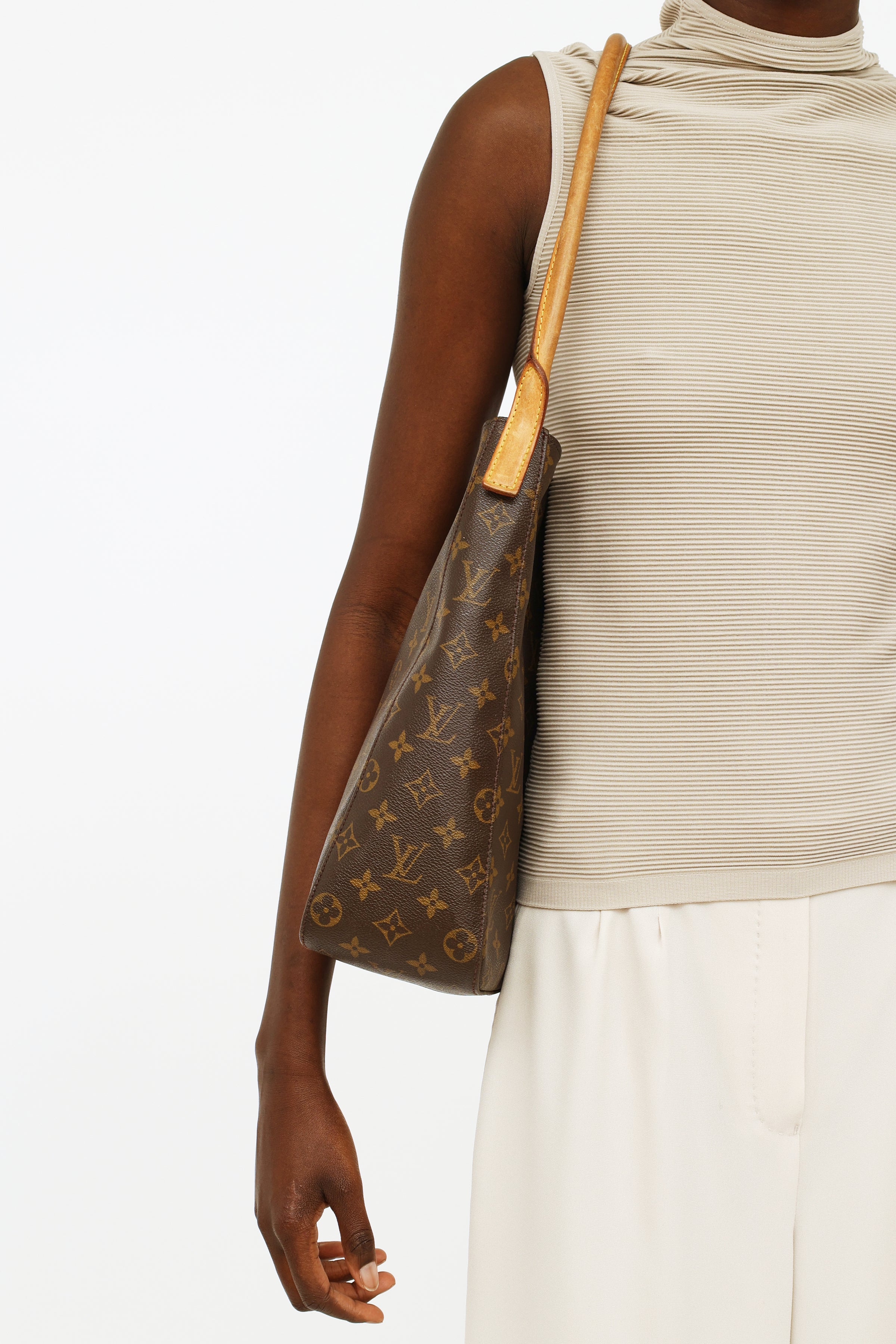 Looping leather handbag Louis Vuitton Brown in Cloth - 36752377