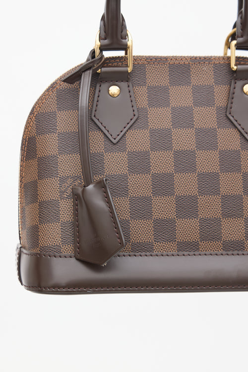 Louis Vuitton Brown Damier Ebene Alma BB Crossbody Bag