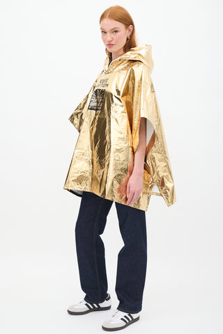 Louis Vuitton SS24 Gold Lamé Hooded Souvenir Poncho