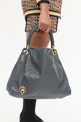 Louis Vuitton Artsy Monogram Empreinte Bag