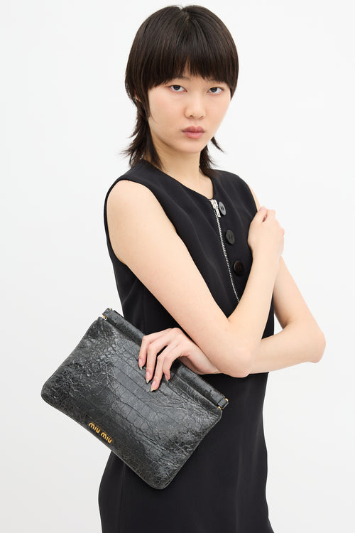 Miu Miu Leather Embossed Clutch
