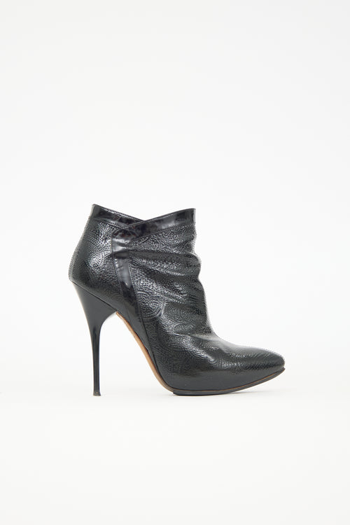 McQueen Debossed Leather Boot