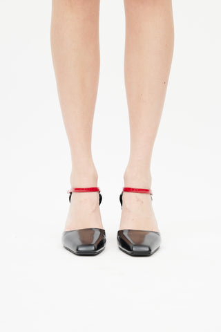 Prada Black & Red Patent Pump