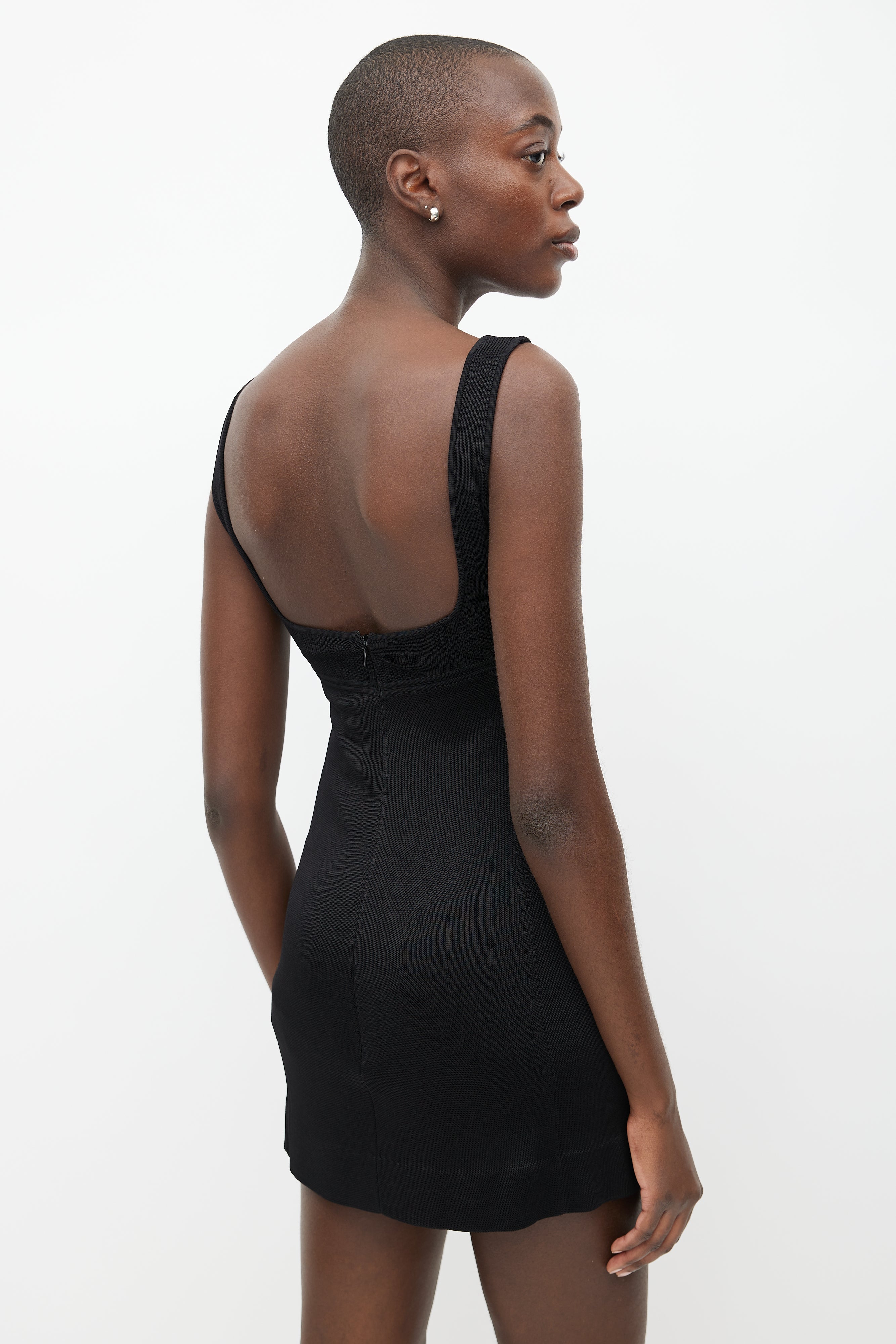Saint Laurent // Black Knit Cut Out Mini Dress VSP Consignment Saint Laurent // Black Knit Cut Out Mini Dress VSP Consignment