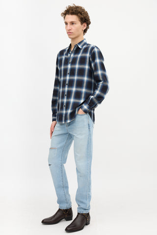 Saint Laurent Distressed Slim Leg Jeans