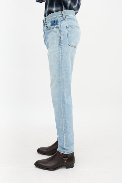 Saint Laurent Distressed Slim Leg Jeans