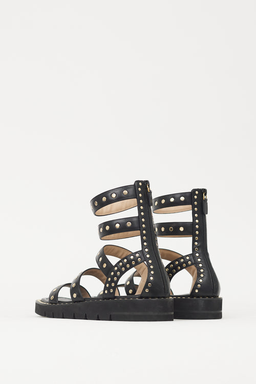 Stuart Weitzman Black & Gold Studded Gala Lift Sandal