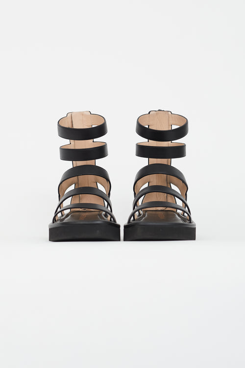 Stuart Weitzman Black Gala Lift Leather Strappy Sandal