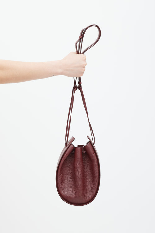 The Row Burgundy Leather Drawstring Pouch Bag