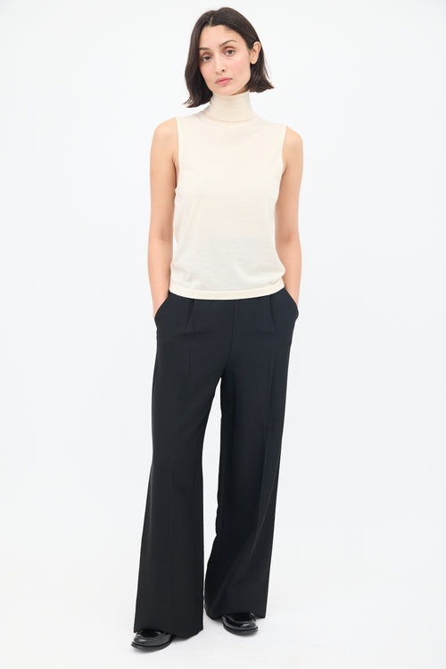 The Row Cream Cashmere Sleeveless Turtleneck Top