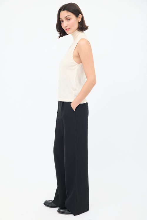 The Row Cream Cashmere Sleeveless Turtleneck Top