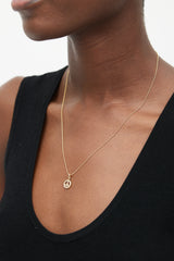 Tiffany & Co. 18k Gold & Diamond Peace Necklace