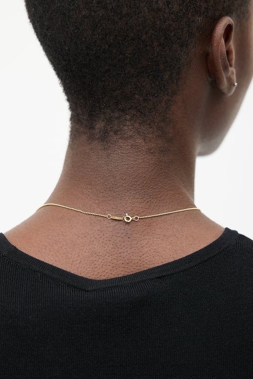 Tiffany & Co. 18k Gold & Diamond Peace Necklace
