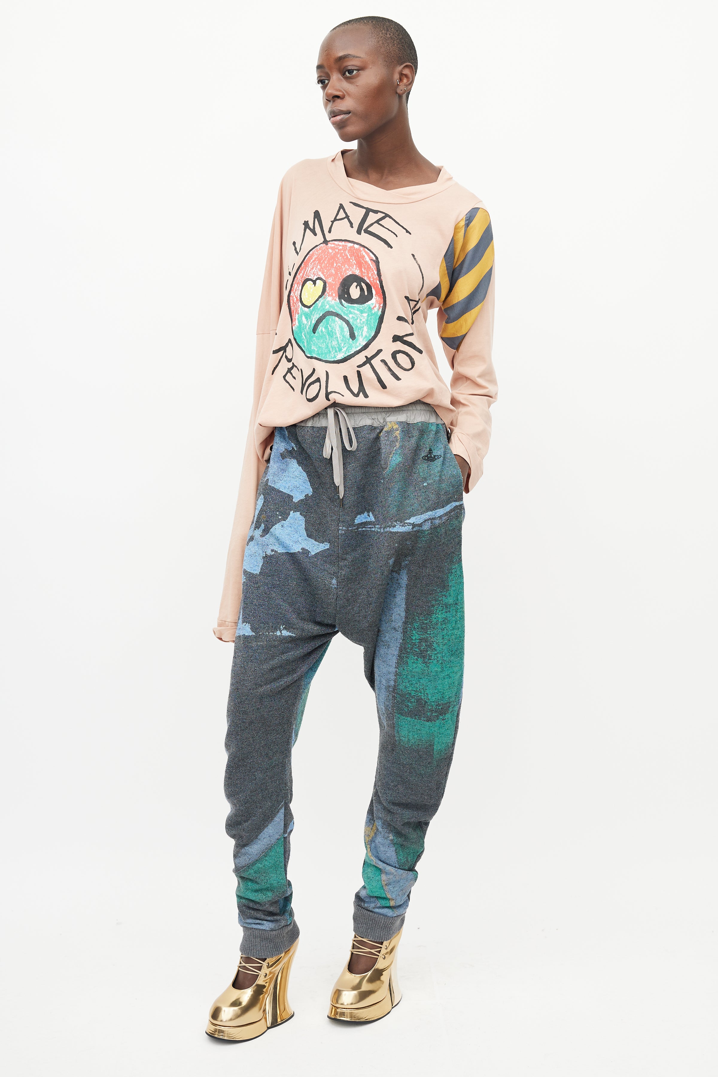 https://vspconsignment.com/cdn/shop/files/Vivienne-Westwood-Multicolor-Printed-Sweatpants-9112_2400x.jpg?v=1698247545