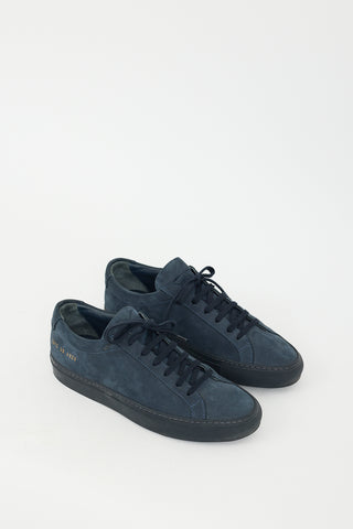 Woman by Common Projects Navy Suede Low Achilles Sneaker