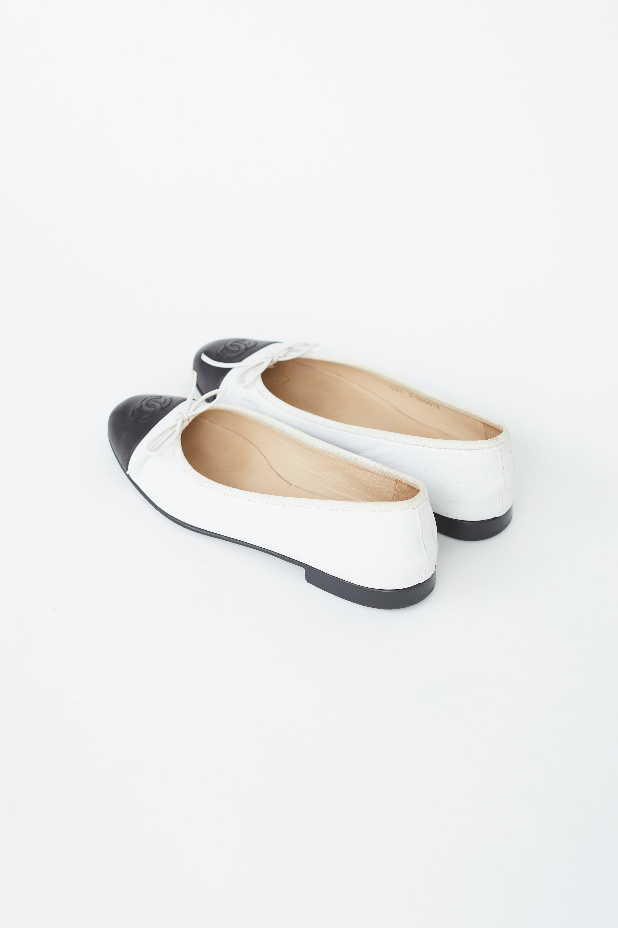 Chanel WhiteBlack Glitter And Canvas CC Cap Toe Bow Ballet Flats Size 395  Chanel  TLC