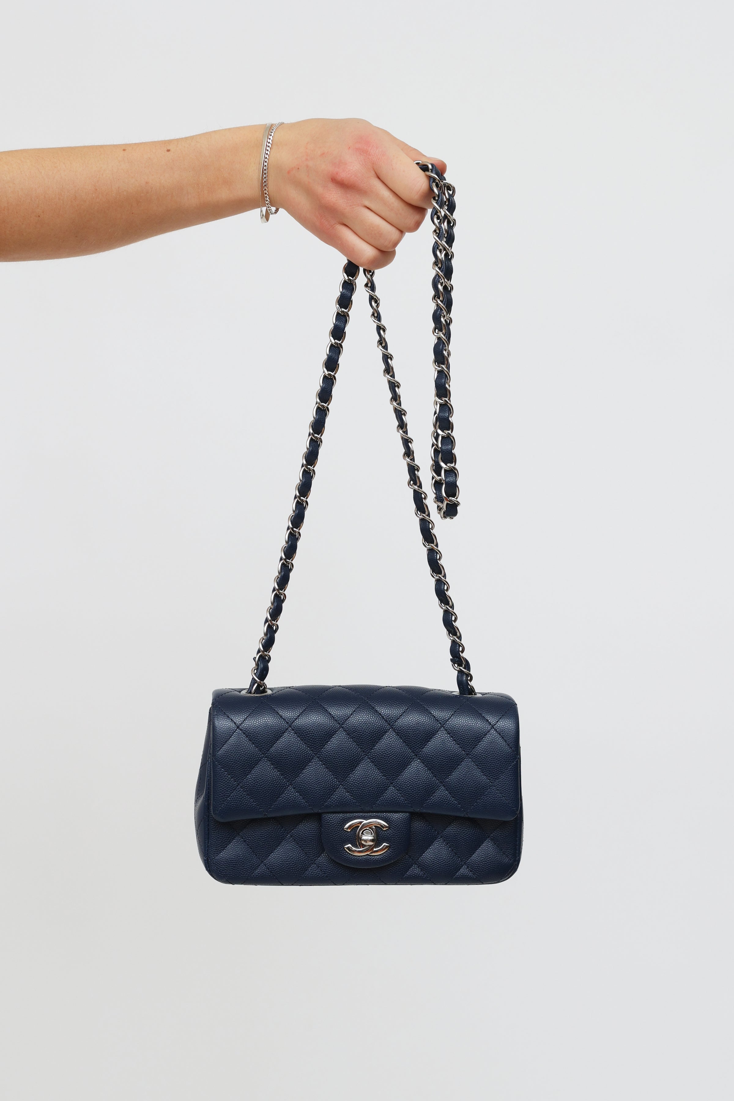 Sold at Auction: Chanel Caviar Navy Leather Flap Bag
