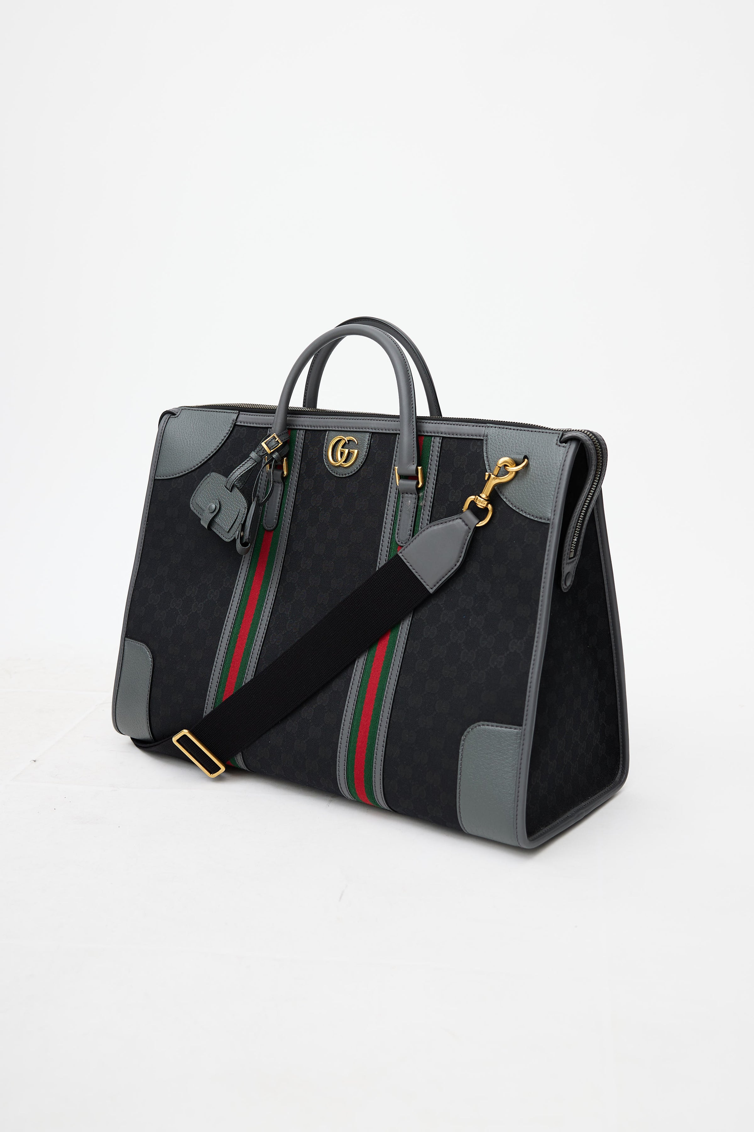 Gucci Savoy large duffle bag in beige and ebony Supreme | GUCCI® US