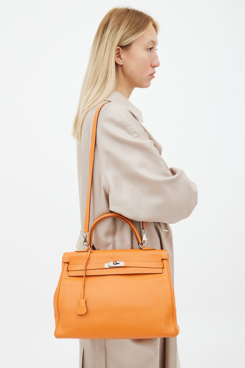 Hermès 2011 Orange Retourne Kelly 35 Leather Bag