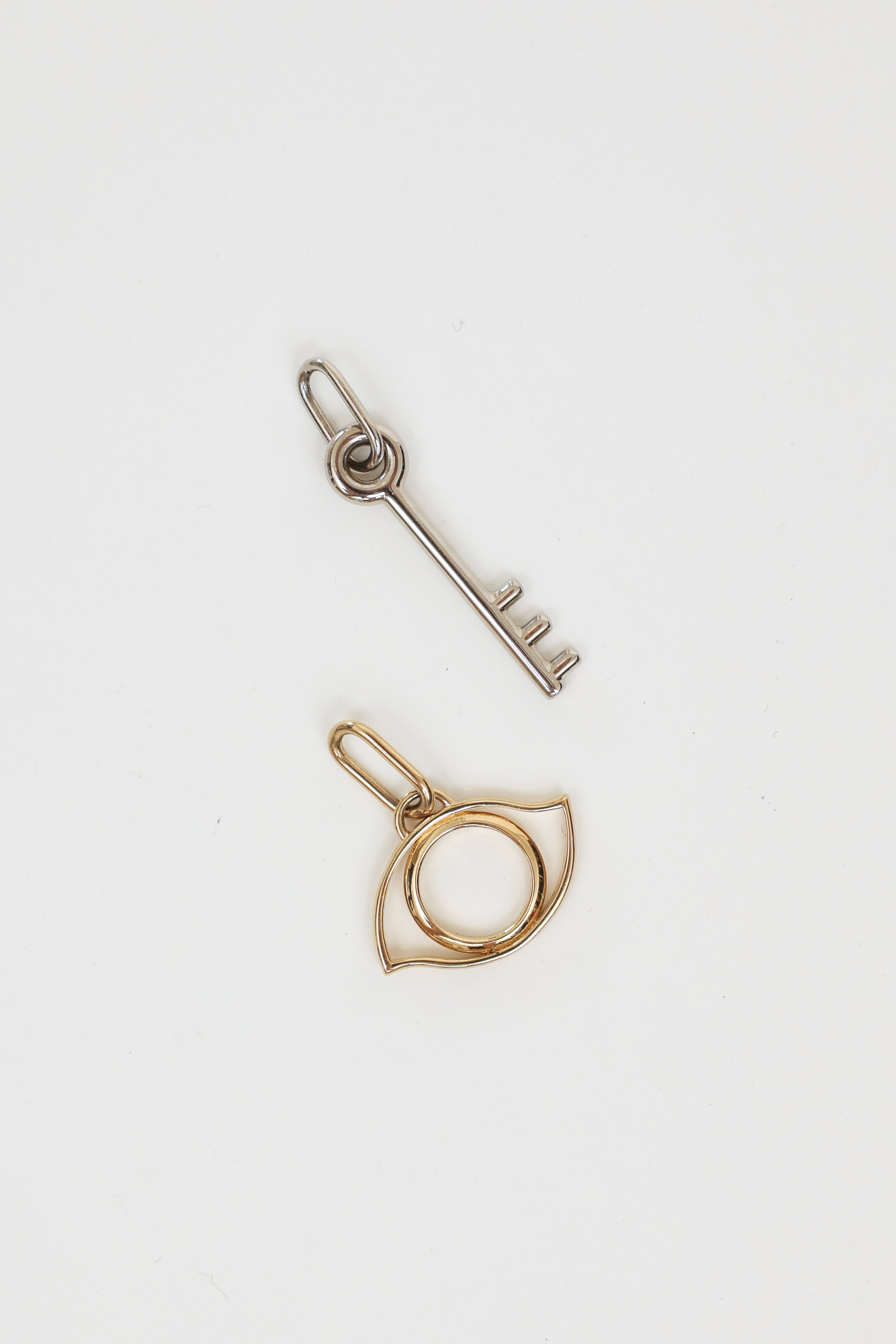 Hermes Gold Veau Swift Leather/Palladium Curiosite Necklace Pendant