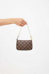 Pochette accessoire mini bag Louis Vuitton Brown in Cotton - 36541439