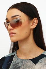 CHANEL, Accessories, Chanel Orange Silver Cc Logo Rimless 47b Sunglasses