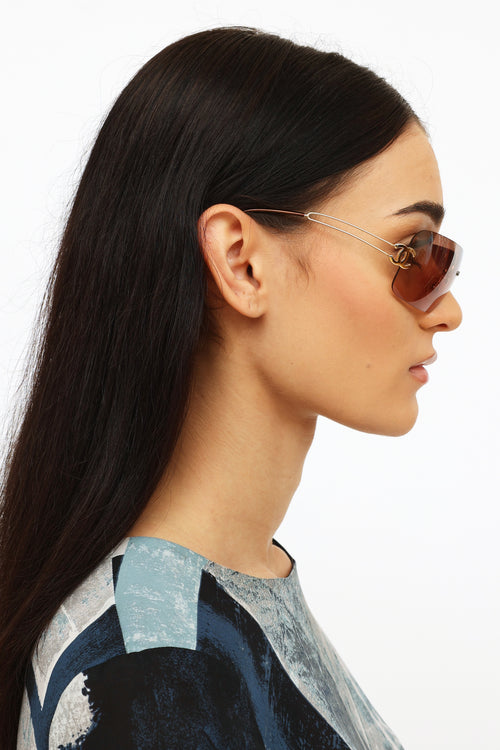 Chanel Brown CC Rimless Sunglasses