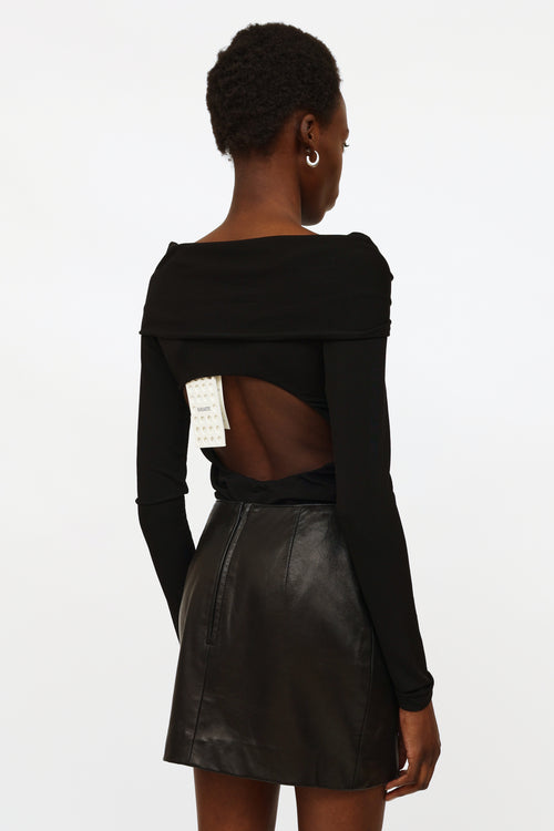 Khaite Black Off-Shoulder Twist Bodysuit