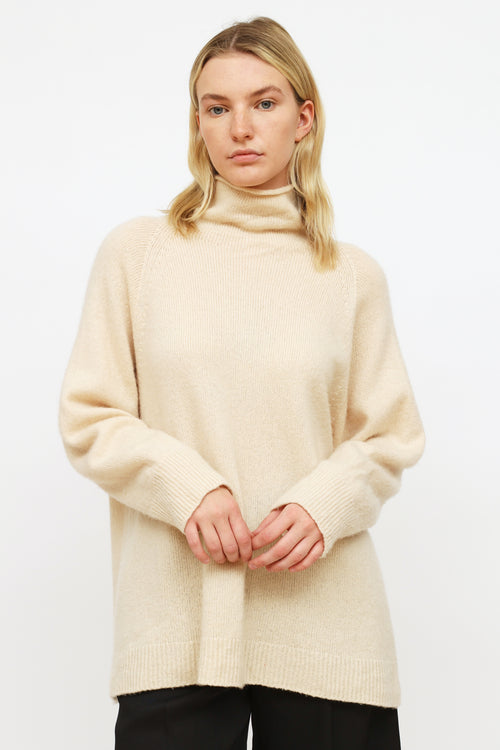 The Row Cream Funnel Neck Sweater