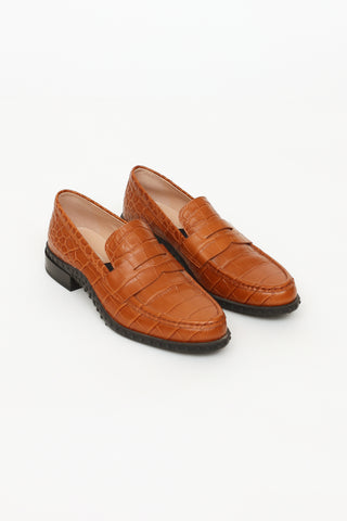 Tod's Brown Embossed Penny Loafers